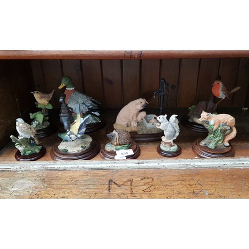 535 - 9 Country Artists figures including Pig with Water Pump (CA580), Fox Asleep (CA364) and Robin on Tro... 