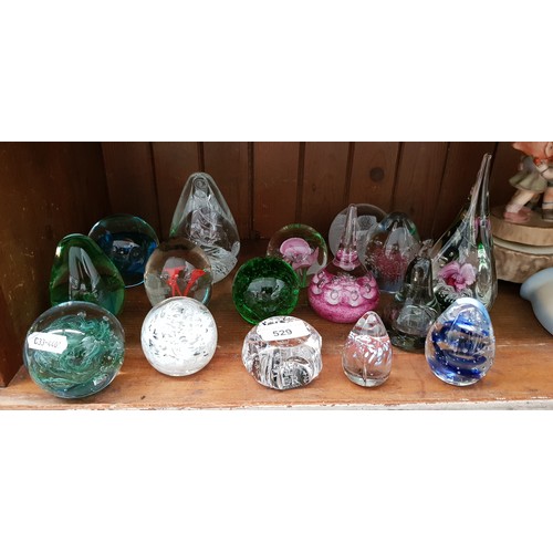 529 - 16 glass paperweights including Caithness, Island Studio Glass (Guernsey) etc