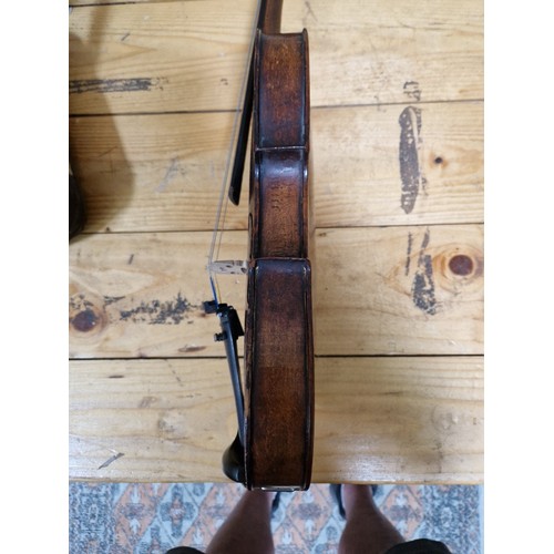 201 - A German 19th century violin, one piece back, length 355mm, with bow stamped Homa, in hard case.