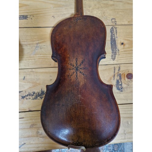 201 - A German 19th century violin, one piece back, length 355mm, with bow stamped Homa, in hard case.