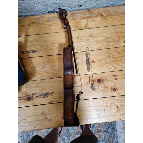 201 - A German 19th century violin, one piece back, length 355mm, with bow stamped Homa, in hard case.