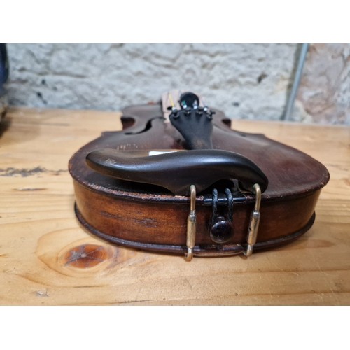 201 - A German 19th century violin, one piece back, length 355mm, with bow stamped Homa, in hard case.