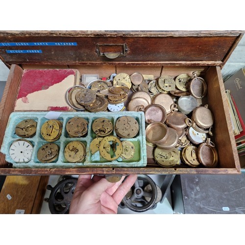 73 - A five drawer horologist's chest and contents comprising watch and clock making spares.