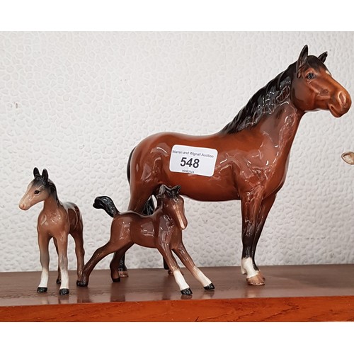 548 - Beswick horse and two foals