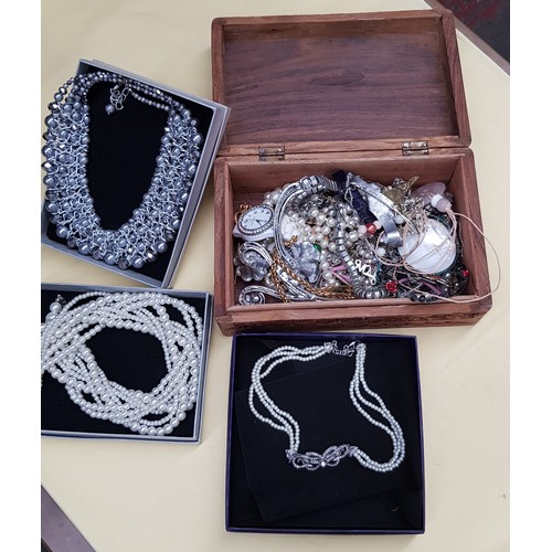 563 - Wooden box of costume jewellery and three boxes with pearls