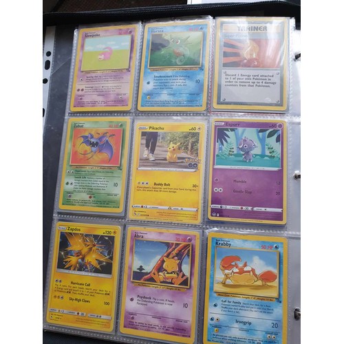 458 - A folder of Pokemon cards, over 200, various sets including GX, EX, promo cards, Pikachu set and Cha... 