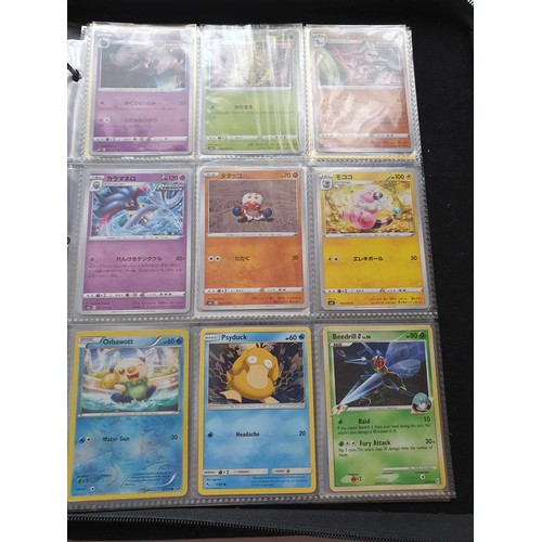 458 - A folder of Pokemon cards, over 200, various sets including GX, EX, promo cards, Pikachu set and Cha... 