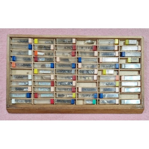 77 - Wooden, plastic and metal cabinets of watch spares.