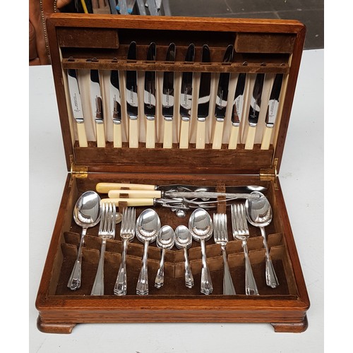 80 - A mid 20th century oak canteen of silver plated cutlery.