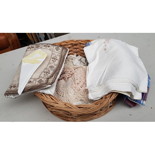 86 - A basket of assorted linen.