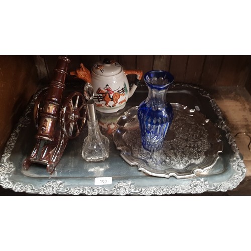 103 - A large silver plated tray, a canon fire tidy, a hunting tea pot and a bohemian blue flash cut glass... 