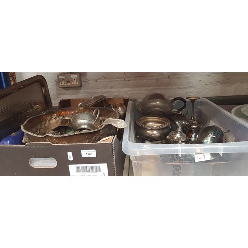 107 - Two boxes of assorted silver plated and other metal ware.