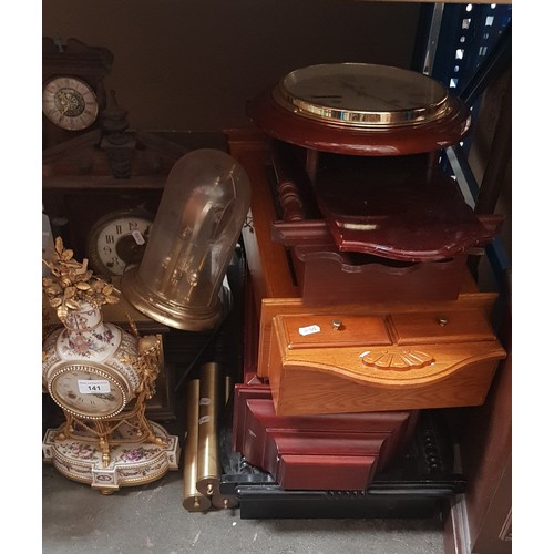 141 - A box of assorted silver plated and metal ware and a mahogany canteen and contents.