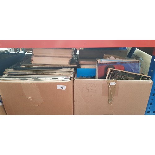 146 - Two boxes of assorted LPs and 45s.