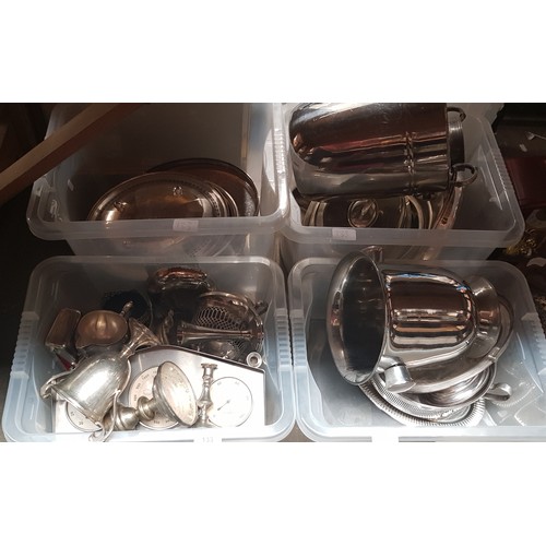 133 - Four plastic boxes of assorted silver plated ware.