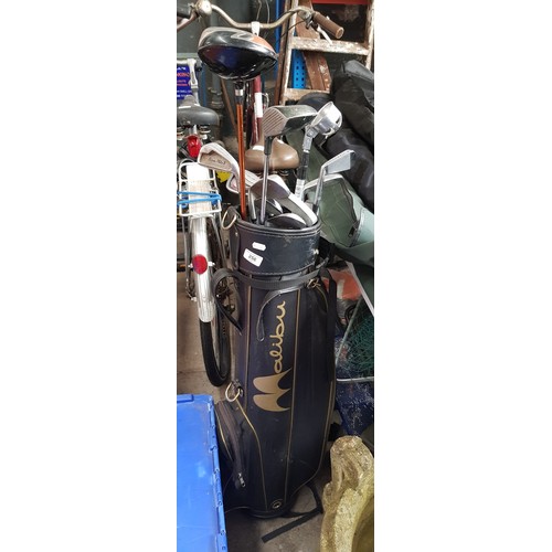 256 - A set of mixed golf clubs to include a Ping 12 degree G10 driver