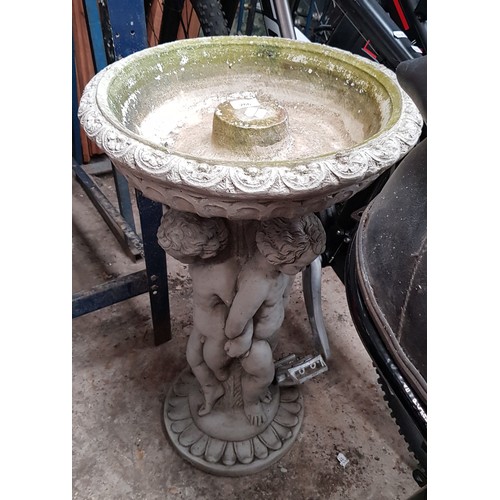 266 - A stoneware pedestal birdbath.