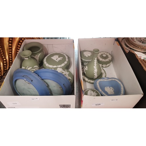 334 - 2 boxes of blue and green Wedgwood jasperware.