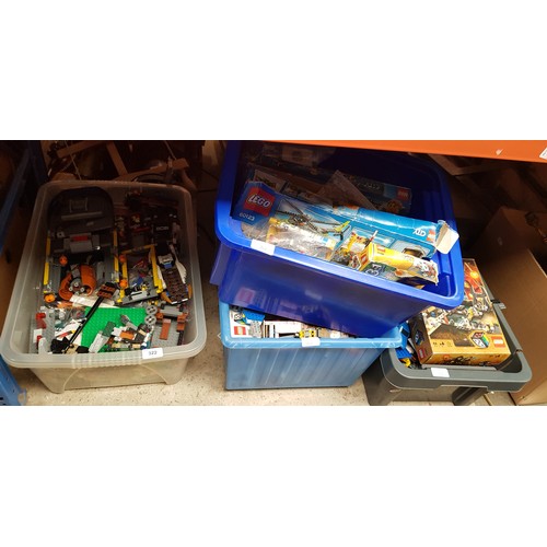 322 - Four boxes of assorted lego