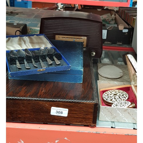 308 - A canteen of cutlery, a box of cutlery, cosmetics box and a Murphy's bakelite radio