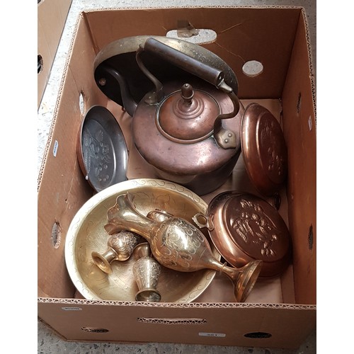 301 - A box of copper and brass including copper kettle, etc.