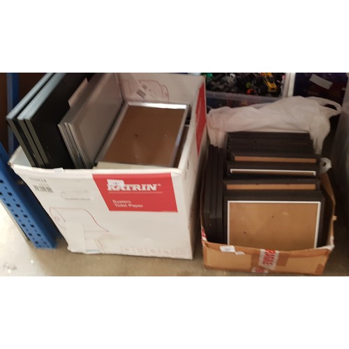 297 - Approximately sixty picture frames in 2 boxes