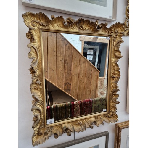 920 - 19th century continental gilt framed mirror, carved giltwood frame, 55.5cm x 65cm.