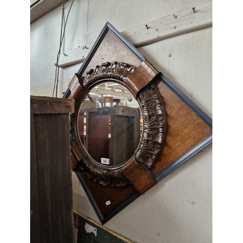 906 - A carved oak framed mirror, 78.5cm x 78.5cm