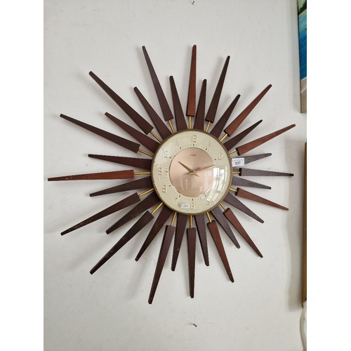 937 - A mid 20th century Metamec sunburst clock, diameter 64cm.