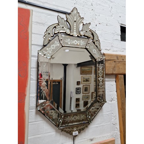 949 - A 1930s Venetian wall mirror, 97cm x 54cm.