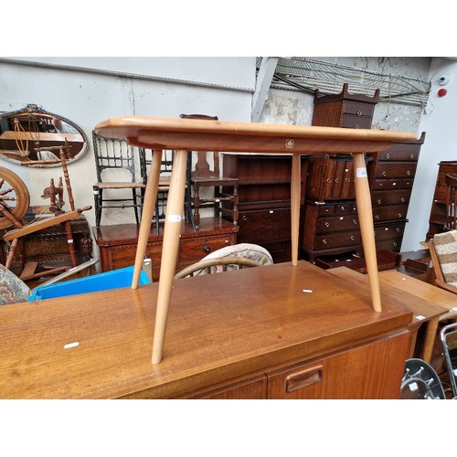 993 - A 1960s Ercol light elm coffee table, model 213, height 45cm, width 72.5cm and depth 44.5cm.