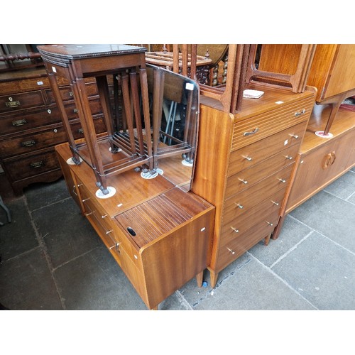 989 - A mid 20th century Austinsuite teak dressing table and matching chest of drawers.