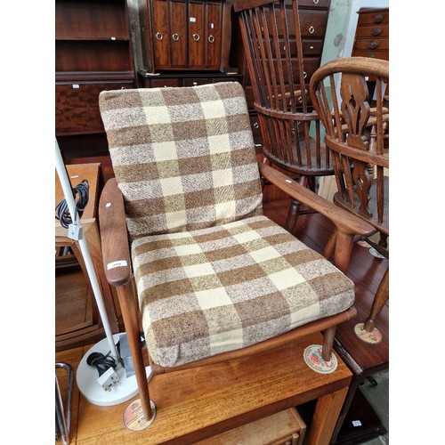 999 - A mid 20th century Danish teak lounge chair