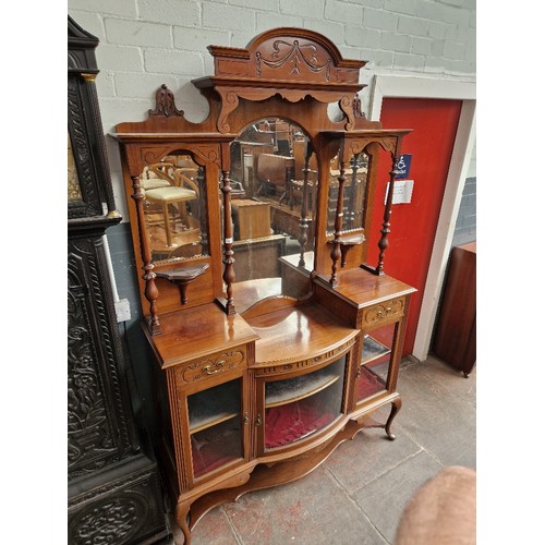 1011 - An Edwardian mahogany mirror back chiffonier/display cabinet.