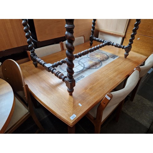 1015 - A mid 20th century Danish teak and tile top extending dining table and four chairs.