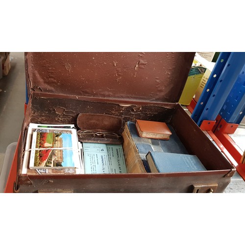 378 - A suitcase of ephemera including postcards, photo negatives,  etc