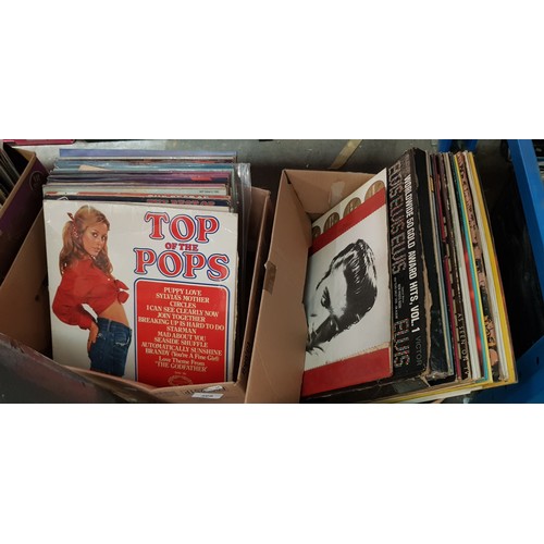 369 - A box of Elvis LPs and a box of Top of The Pops LPs