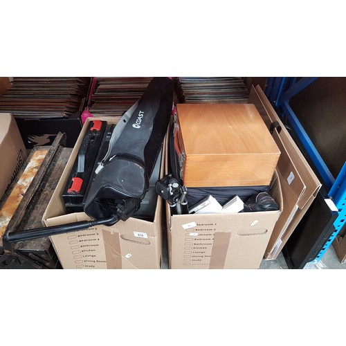 410 - 2 boxes of photographic equipment including slides, tripods, portfolio of sketches and a small tv