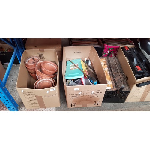 409 - A toolbox, a box of tools and a box of earthenware plant pots