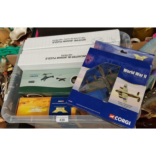 430 - Three die cast model aircraft (two Corgi and one Oxfrod) and two jigsaws depicting technical drawing... 