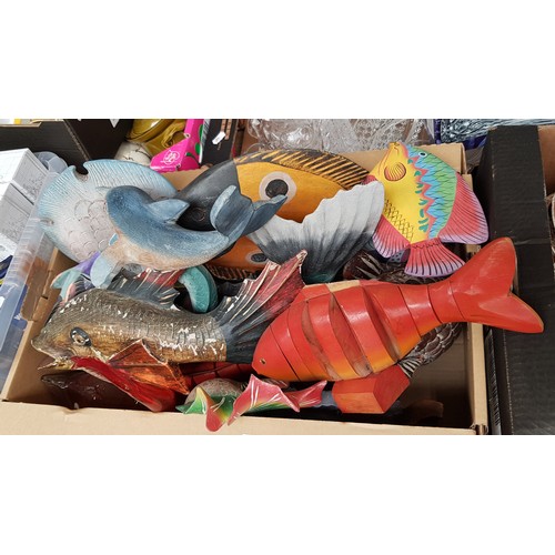 429 - A box of various fish ornaments, carved wood, ceramic and one glass.