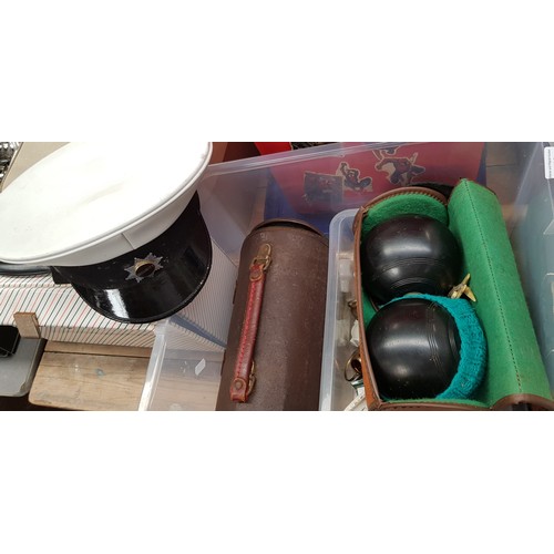 458 - A group of assorted items to include 2 sets of crown green bowls, a security hat & a box of crested ... 