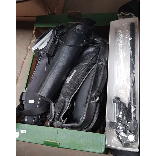 450 - A box of photographic items including Opticron spotting scope, lenses, tripods, chargers etc