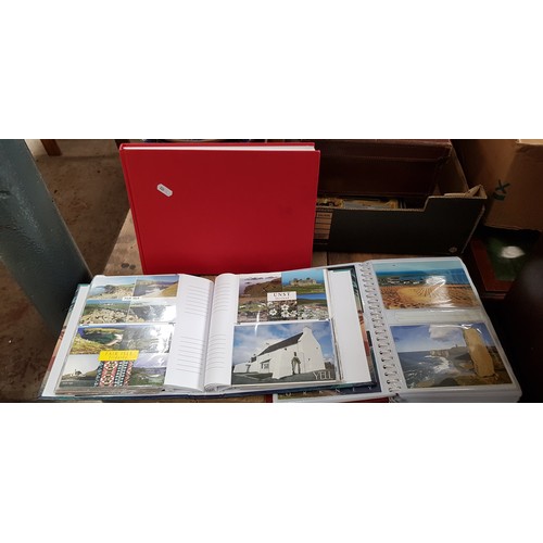 479B - Two albums of postcards mainly featuring Scotland and Scottish Isles, together with a book detailing... 