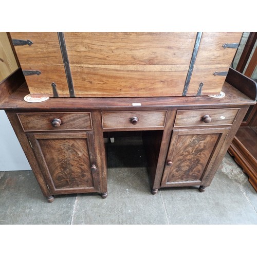 1017 - A late Georgian mahogany washstand.