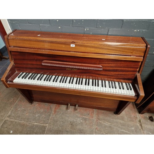 1036 - A modern Zender upright overstrung piano, mahogany case.