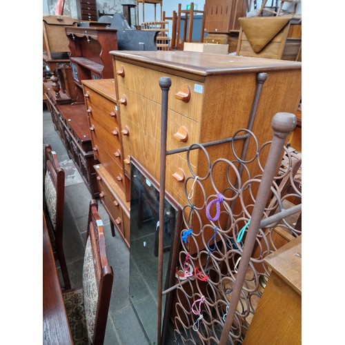 1035 - A mid 20th century teak dressing table, two matching chests of drawers, matching headboard with beds... 