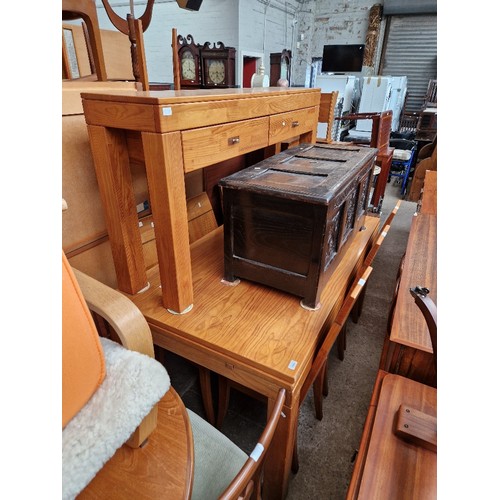 1068 - A Sanclus pine extending dining table with 6 chairs & matching 2 drawer side table.