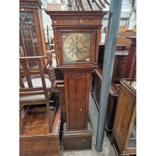 1042 - A Georgian oak 8 day longcase clock with brass dial, by Robert Scholfield.