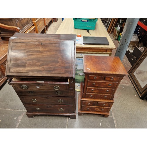 1096 - An Edwardian inlaid mahogany bureau & a small mahogany chest on chest